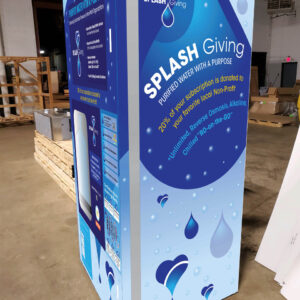 A large cardboard box with a splash giving advertisement on it.